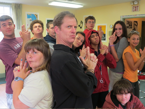 Kevin Flynn, “Stand Up & Learn™” founder and director, with students.